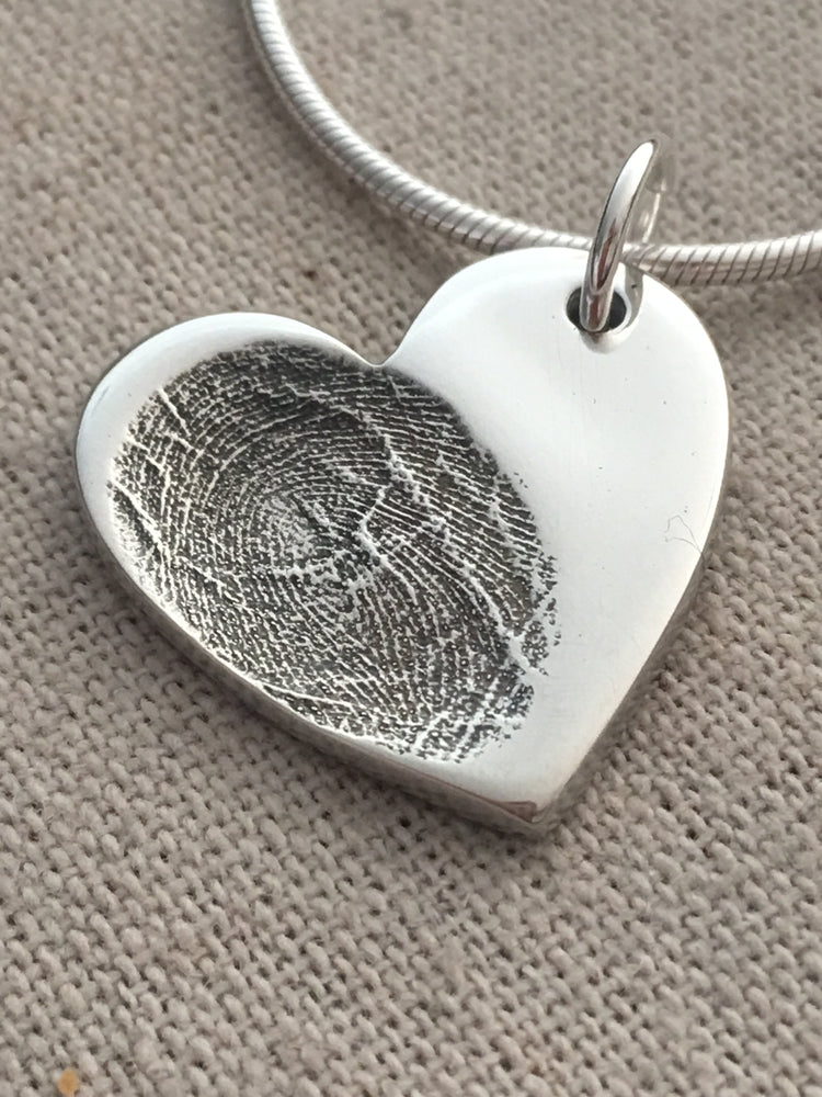 Double sided fingerprint charm with handwriting